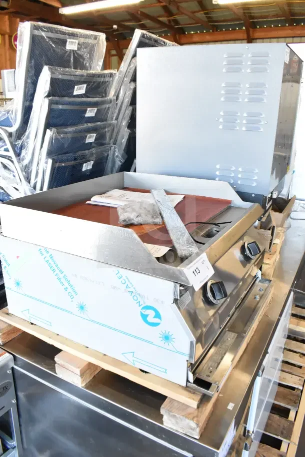 Brand new Garland ED-24G Designer Series 24" electric griddle, 208V, 1 Phase, in scratch and dent condition, on pallet.