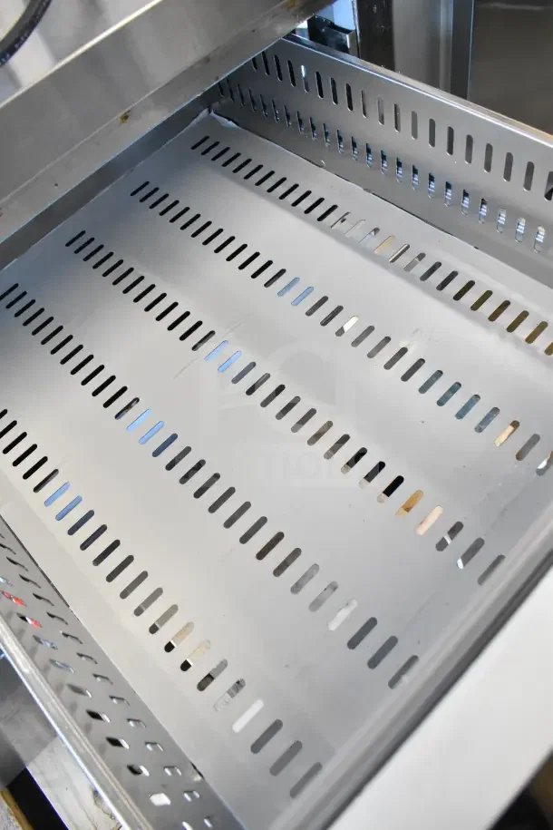 Avantco Commercial Undercounter Cooler interior, showing stainless steel perforated shelves. Appears brand new, 115V, 1 Phase.