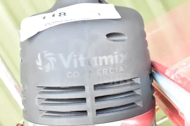 Brand new VitaMix VM0224 immersion blender head with minor scratches. Black casing with "Vitamix Commercial" branding.