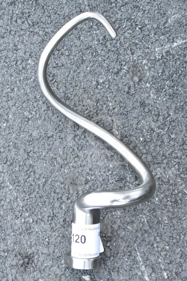 Brand new dough hook attachment for mixer; stainless steel with minor scratches. Label indicates auction item number 120.