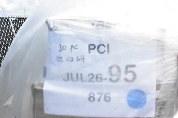 29 new scratch and dent items including plates and cups. Packaging shows label "30 pc PCI JUL26-95 876."