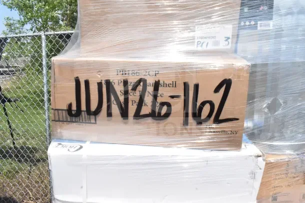 Cardboard box wrapped in plastic, labeled JUN26-162, containing 36 scratch and dent items like plates and glasses.