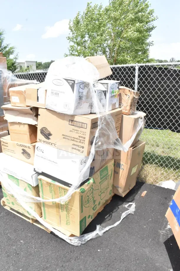 Pallet of 28 boxed items including hot cups, spoons, and appetizer cups, marked as new scratch and dent.