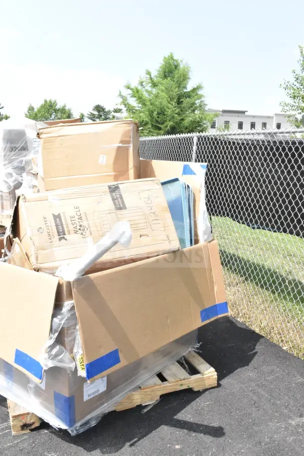 Boxes of 18 new scratch and dent items, including trash can, drying rack, steam table, on pallet, partially wrapped.