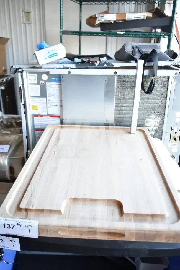 Brand new John Boos cutting board, scratch and dent condition, with juice groove, natural wood finish.