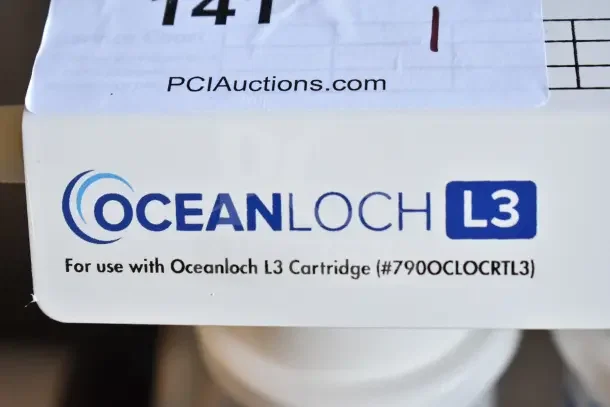 BRAND NEW Scratch and Dent C Pure Oceanloch+ L3 Triple Water Filtration System, 1 Micron, 5 GPM, includes cartridges and pressure gauge.