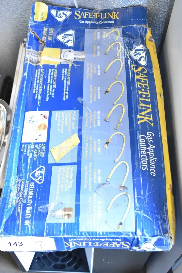BRAND NEW T&S Safe-T-Link 48" yellow gas connector hose with FreeSpin fitting and install kit, 3/4" NPT. Box shows wear.