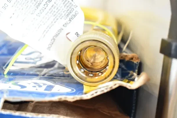 Brand new T&S HG-4D-48K 48" yellow gas hose, 3/4" NPT, with Safe-T-Link Quick Disconnect, FreeSpin fitting, and installation kit.