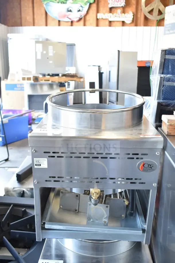BRAND NEW Cooking Performance Group WOKR16N natural gas wok range with 16" ring, 125,000 BTU, visible logo, and control panel.