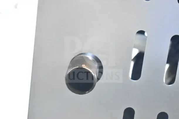 Metallic component of a new Cooking Performance Group commercial single burner gas stock pot range, showing scratch and dent.