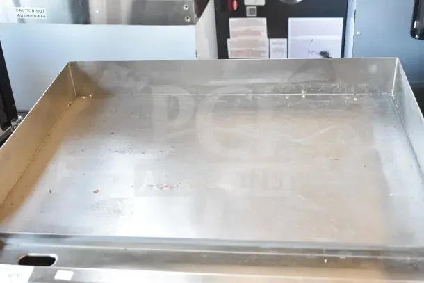 Avantco EG24N 24" electric countertop griddle, slight scratches, 208/240 volts, 1 phase, brand new condition.