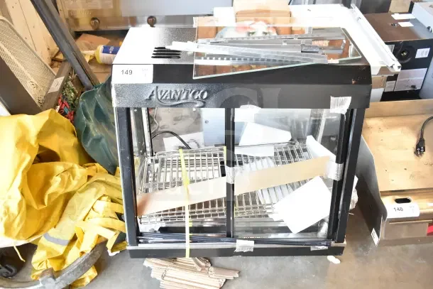 Brand new Avantco 177HDC26, 26" heated display case with sliding doors, 3 shelves, 120V, scratch and dent condition.