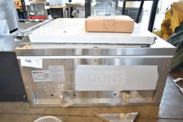 New 2024 ServIt 423EST2WS two-pan electric steam table, 120V, sealed wells, adjustable undershelf. Scratch and dent condition.