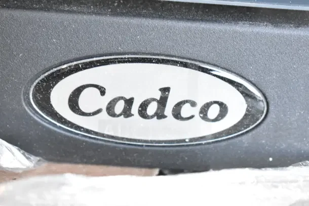 Cadco Lisa OV-013 convection oven logo, black with white lettering, highlighting the brand name "Cadco."