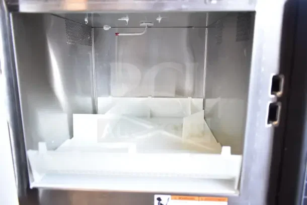 Interior of Amana RC17S2 Heavy Duty Stainless Steel Commercial Microwave Oven, showing a clean, roomy cooking chamber.