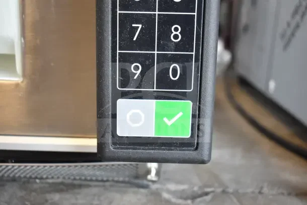 BRAND NEW Amana RC17S2 heavy-duty stainless steel microwave with push button controls, 208/240V, slight scratch and dent condition.