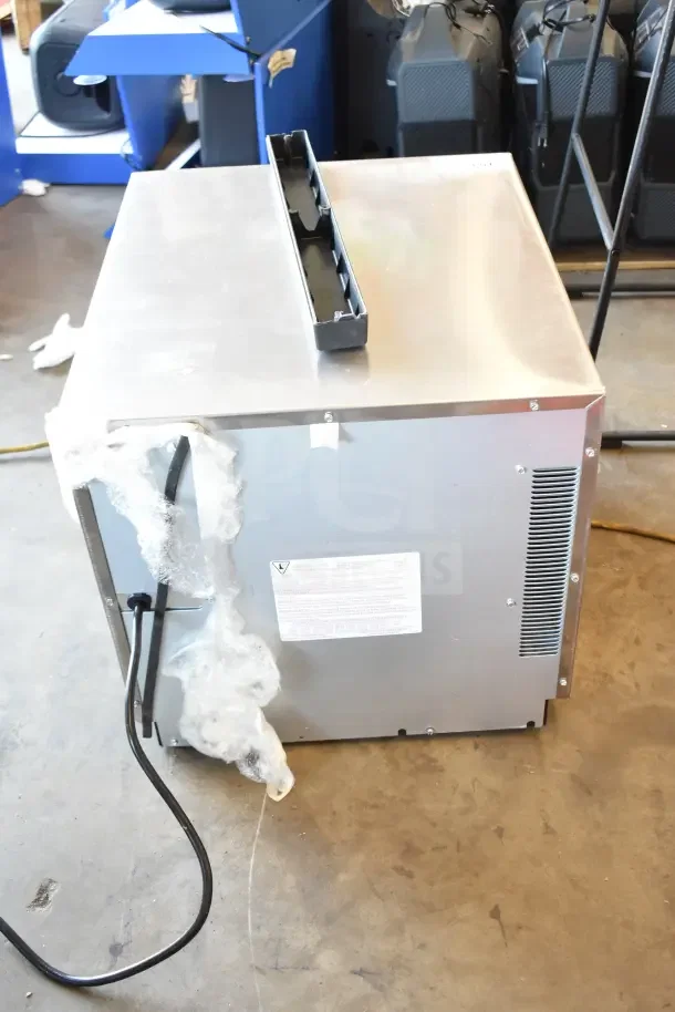 BRAND NEW Amana RC17S2 heavy duty stainless steel commercial microwave, slight cosmetic scratches. 208/240V, push button controls.