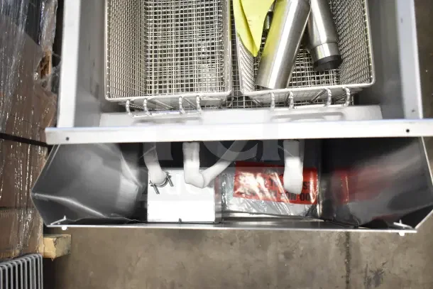 Brand new 2025 Imperial IFS-40-E 40 lb. electric fryer, 240V, 3 phase, with baskets and components visible. Scratch and dent condition.