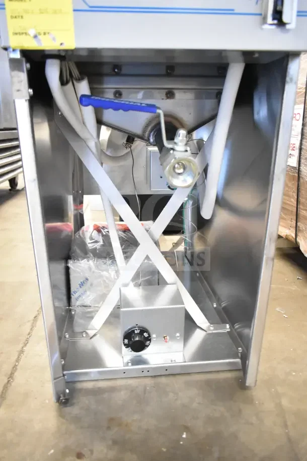 Brand new Imperial IFS-40-E 40 lb. electric fryer, 240V, 3 phase, interior view showing components and wiring, minor scratches.