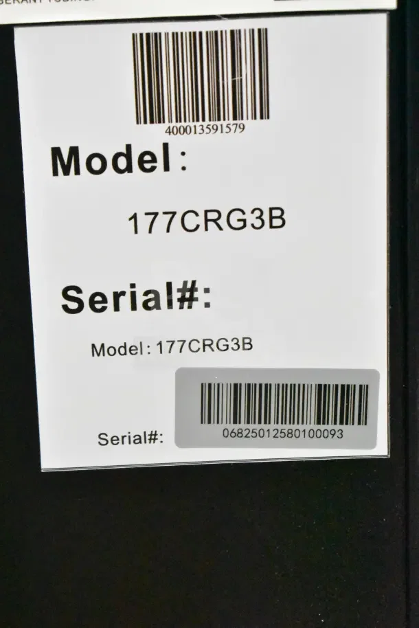 BRAND NEW SCRATCH AND DENT Galaxy 177CRG3B countertop display merchandiser, 2.5 cu ft, black, 110-120V, 1 Phase. Tags show model and serial numbers.