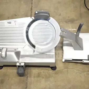 BRAND NEW Hobart EDGE10-11 10" manual meat slicer with blade sharpener. 115V, 1 phase. Model 2022. Scratch and dent condition.
