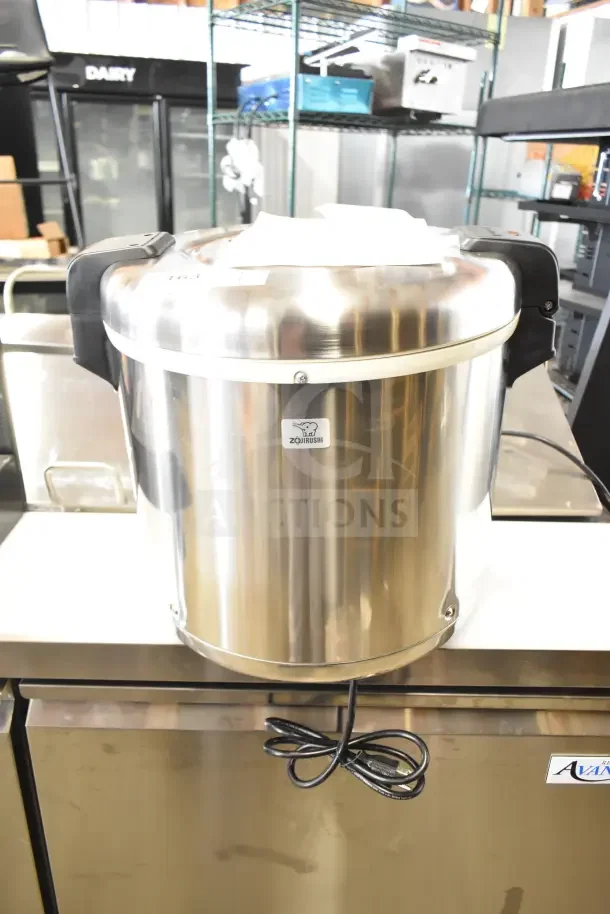 Brand new Zojirushi THA-803S stainless steel electric rice warmer, 88-cup capacity, with removable pot, 120V, 1 phase.