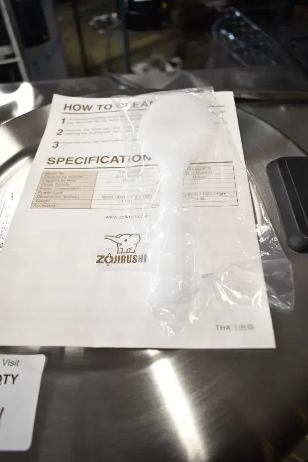 Zojirushi THA-803S 88 Cup Rice Warmer, stainless steel, scratch and dent, with instructions and accessory spoon, 120V.