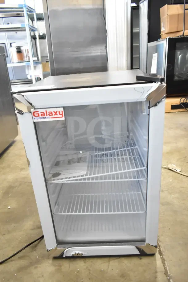 Brand new Galaxy 177CRG3B black customizable countertop display refrigerated merchandiser, 2.5 cu ft. Scratch and dent, 115V, 1 phase.