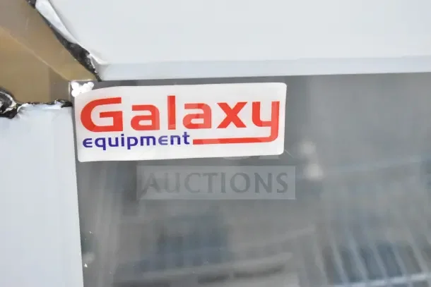 Brand new Galaxy 177CRG3B Countertop Display Refrigerated Merchandiser, 2.5 cu ft, 115V, black, minor cosmetic damage.