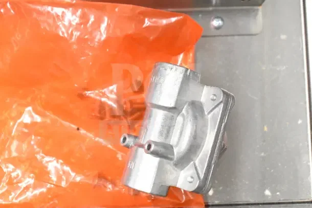 Brand new 2025 ServIt 423GST2WELP steam table part, liquid propane, metal contraption, over orange packaging, 7000 BTU.