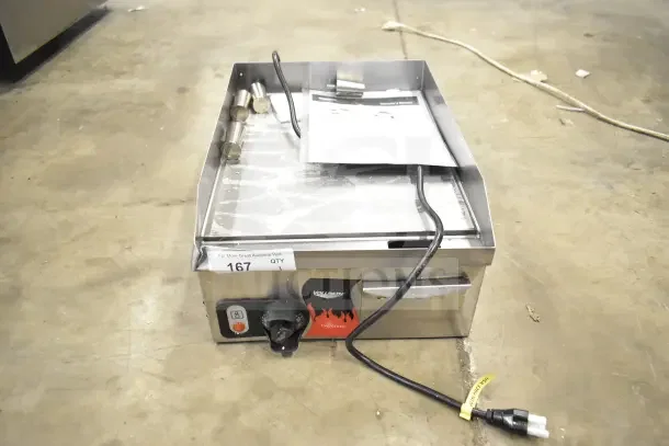 BRAND NEW Vollrath FTA 7016 40715 Cayenne 14" Electric Countertop Grill, 120V, 1 Phase, visible manual, minor scratch and dent.