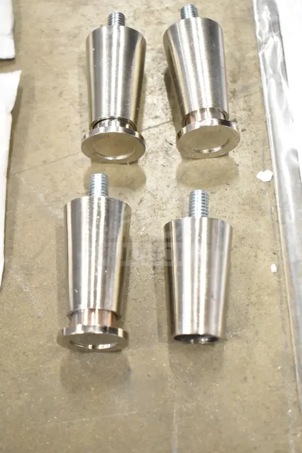 Four metal adjustable legs for Vollrath Cayenne electric grill, brand new condition, featuring threaded top for secure attachment.