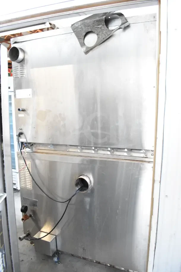 2 Hardt Inferno GC/4000 commercial rotisserie ovens on casters, natural gas powered, 68,000 BTU each, stainless steel.