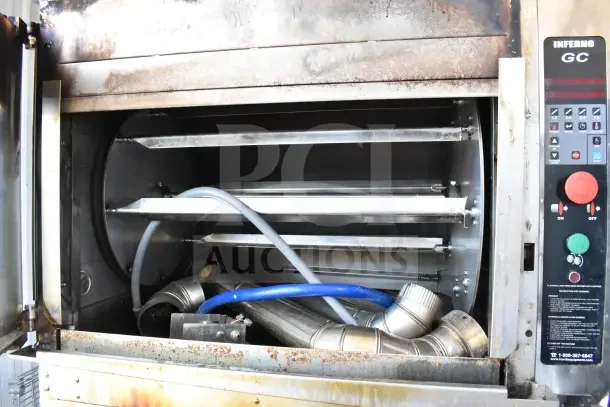 Hardt Inferno GC/4000 commercial rotisserie oven, natural gas powered, 68,000 BTU, on casters, visible control panel.