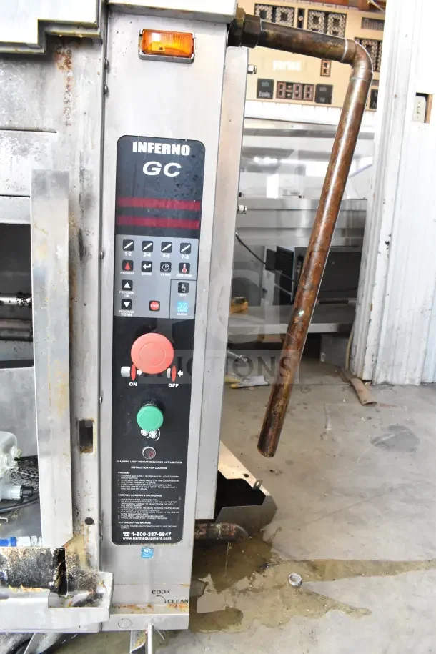 Hardt Inferno GC/4000 commercial gas rotisserie oven on casters, 68,000 BTU, metal control panel with wear, visible labels.