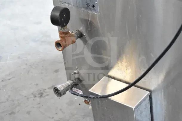 2 Hardt Inferno GC/4000 rotisserie ovens, natural gas powered, on casters. 68,000 BTU, commercial-grade, visible connectors.