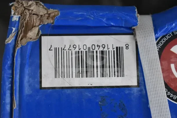 DuroMax XP650WX water pump packaging with visible barcode. Box shows wear and tear. Item is brand new, scratch and dent.