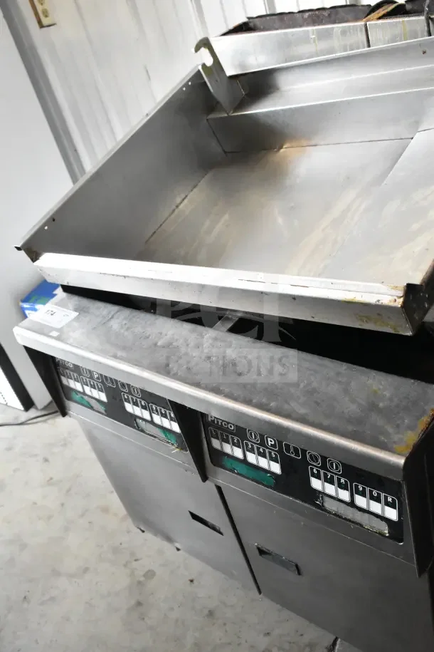 Pitco Frialator commercial gas 2-bay deep fat fryer on casters, stainless steel, showing control panel and casters.