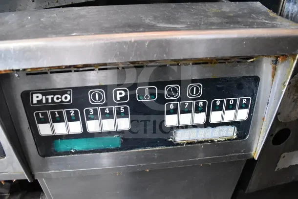 Pitco Frialator commercial gas-powered 2-bay deep fat fryer control panel, showing labels and buttons for settings.