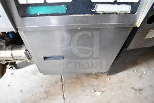 Pitco Frialator commercial gas 2-bay deep fat fryer on casters, stainless steel, control panel visible, moderate wear.