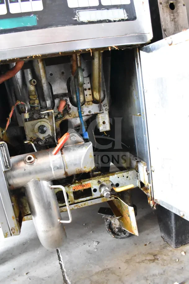 Pitco Frialator commercial gas-powered 2-bay deep fat fryer on casters, showing internal components and labeled "120 volts."