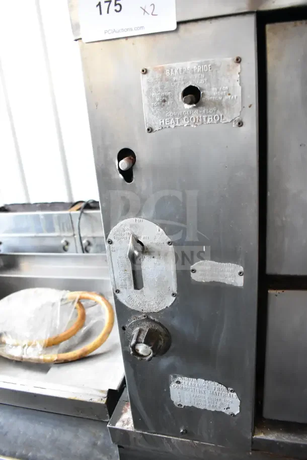 Bakers Pride single deck pizza oven, commercial gas-powered, metal legs, visible heat control markings, used condition.