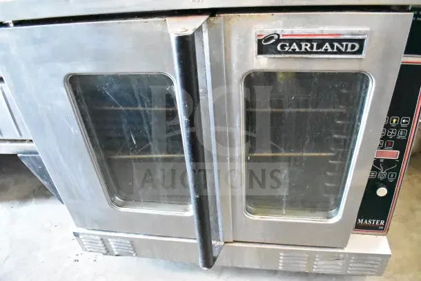 Garland Master 200 commercial convection oven with view-through doors and thermostatic controls, stainless steel, used.
