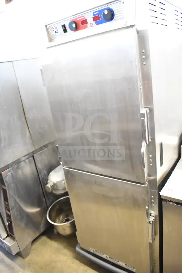 Metro C599-SDS-LPDSA heated holding cabinet on casters. Stainless steel, front controls, dual doors, 120V, 1 phase power.