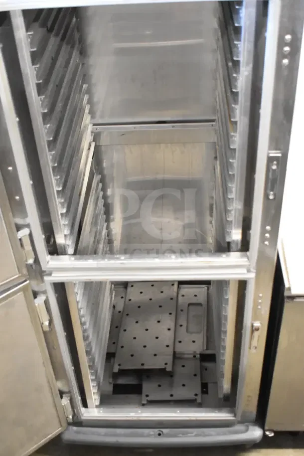 Metro C599-SDS-LPDSA Commercial Heated Holding Cabinet on casters, 120V, 1 Phase, stainless steel interior, shows multiple shelves.