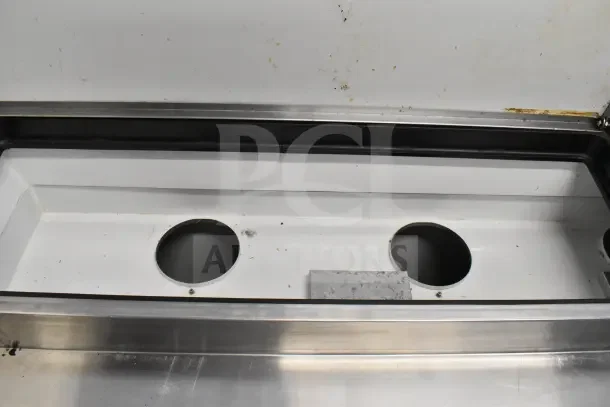True TPP-67 commercial pizza prep table, stainless steel on casters, 115V, 1 phase, interior compartments visible.