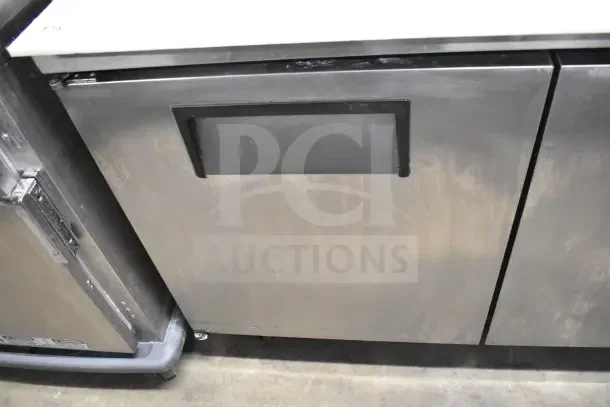 True TPP-67 Commercial Pizza Prep Table on casters, stainless steel, 115V, 1 phase, clean condition.
