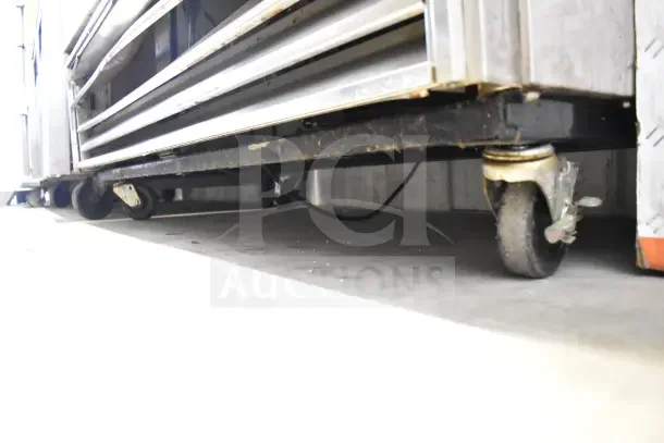 True TS-49 Commercial 2 Door Reach In Cooler on casters, 115 volts, 1 phase; features sturdy construction.