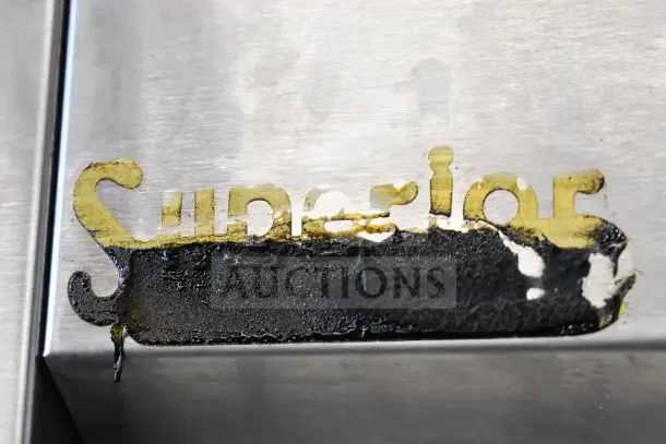 True TS-49 Commercial 2 Door Reach-In Cooler, 115 Volts, 1 Phase, on casters. Damaged label on metal surface.