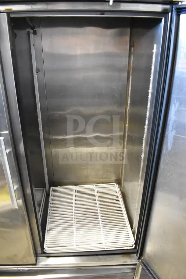 True TS-49 commercial cooler, 2-door, stainless steel interior, on commercial casters, 115 volts, 1 phase.